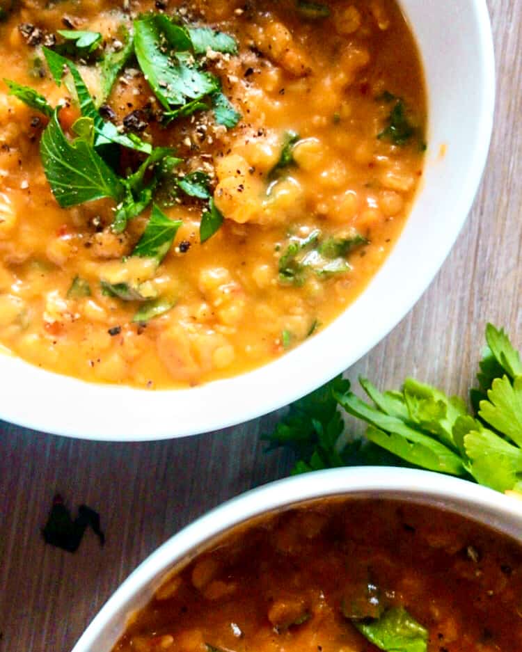 vegan red lentil soup recipes in white bowl