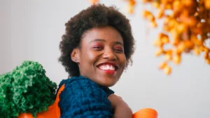 Lady holding bag of lettuce