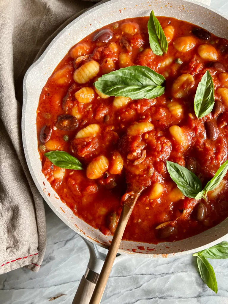 Vegan Gnocchi Puttanesca with basil