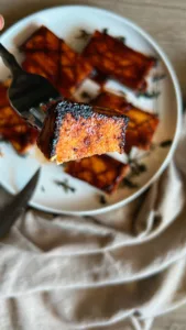 Maple Glazed Tofu steaks on fork