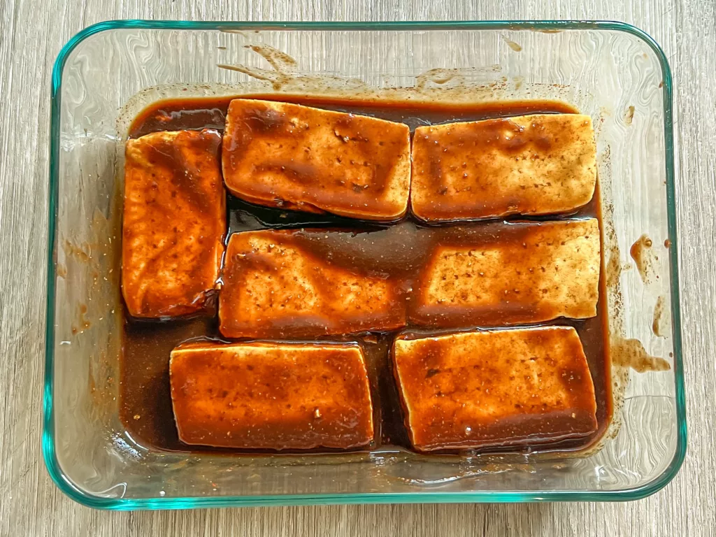 tofu marinating in glass jar