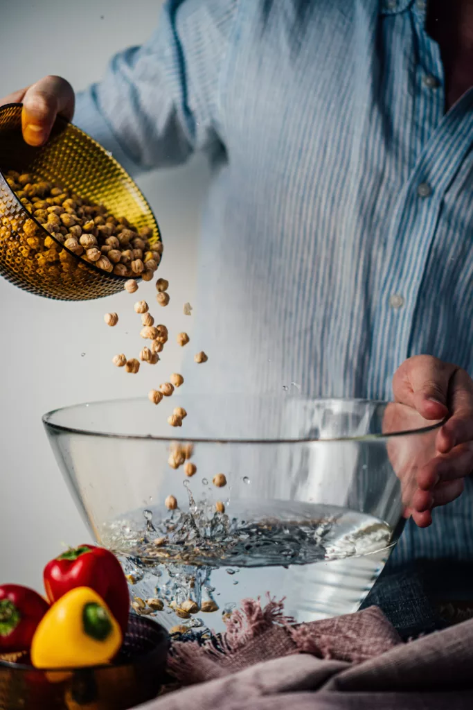 washing-chickpeas-in-glass-bowl