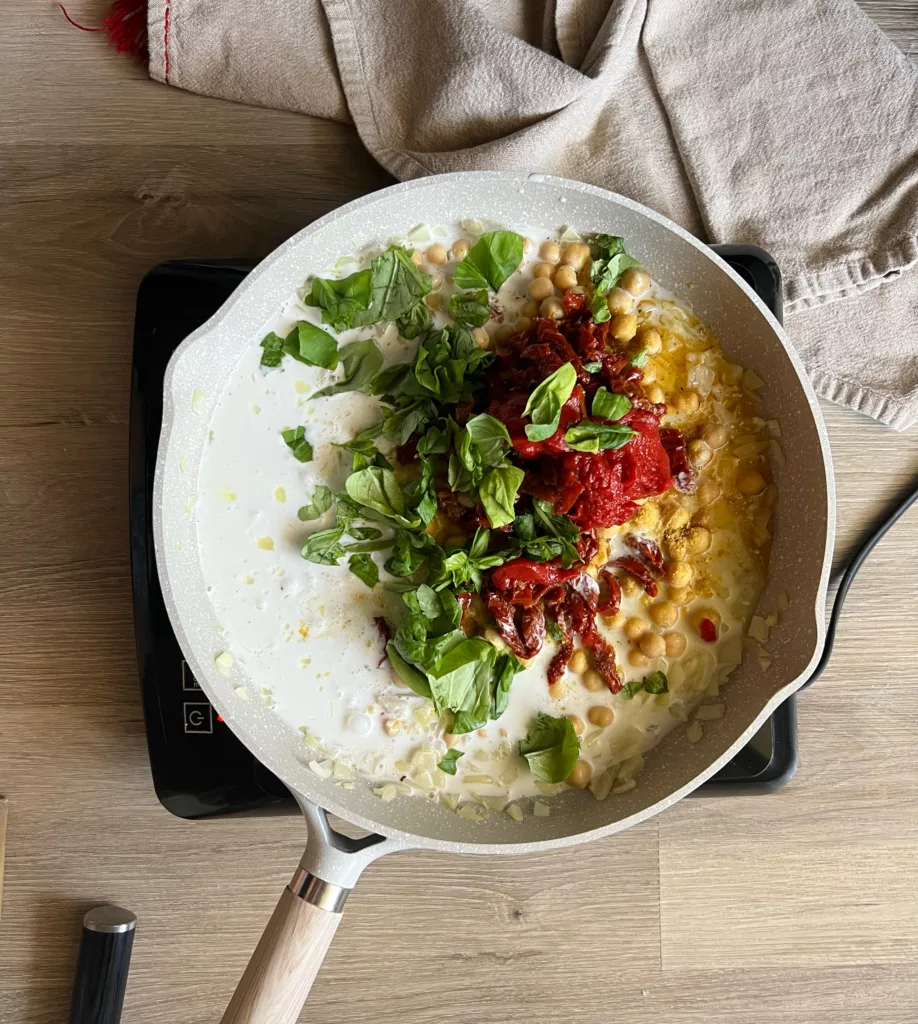 vegan Tuscan Chickpea ingredients in frying pan