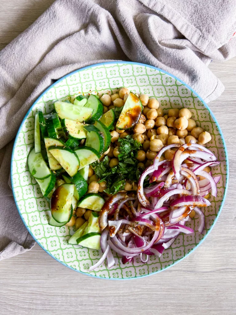 balsamic chickpea salad in white and green bowl