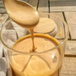 peanut satay sauce on spoon