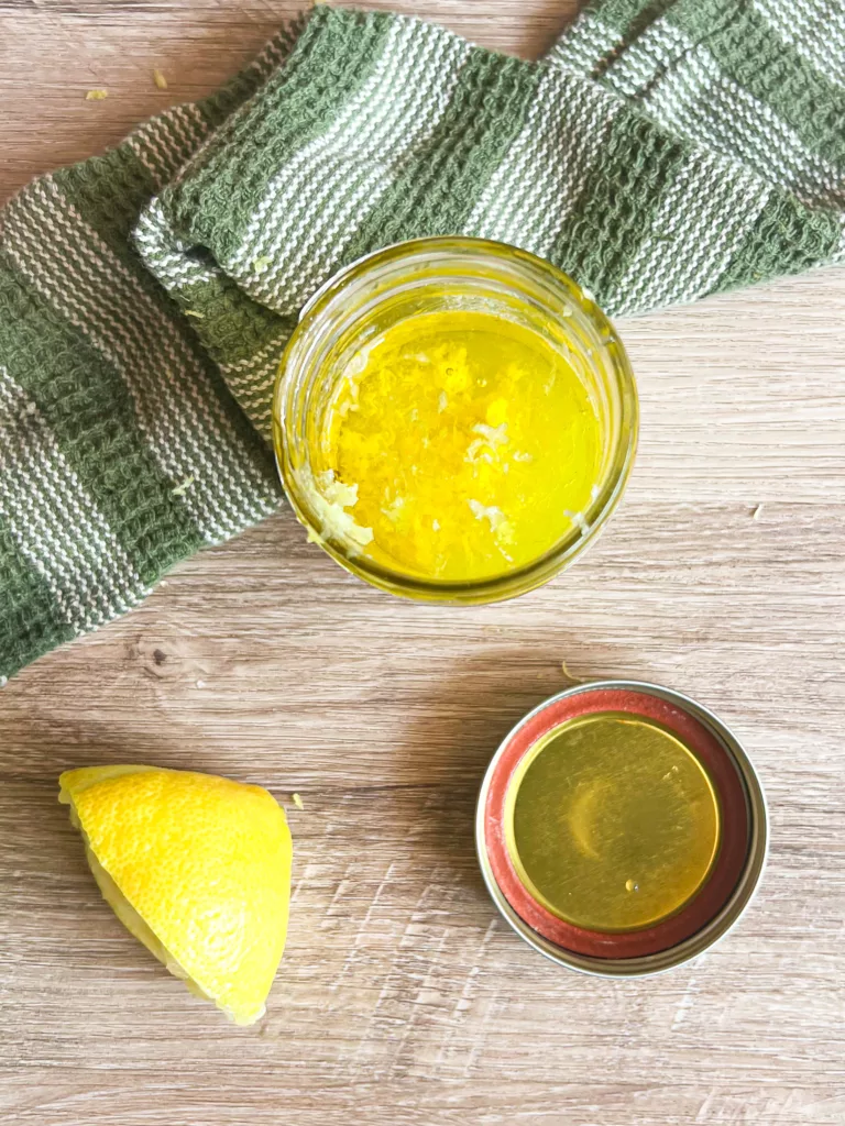 Lemon vinaigrette dressing top view in jar