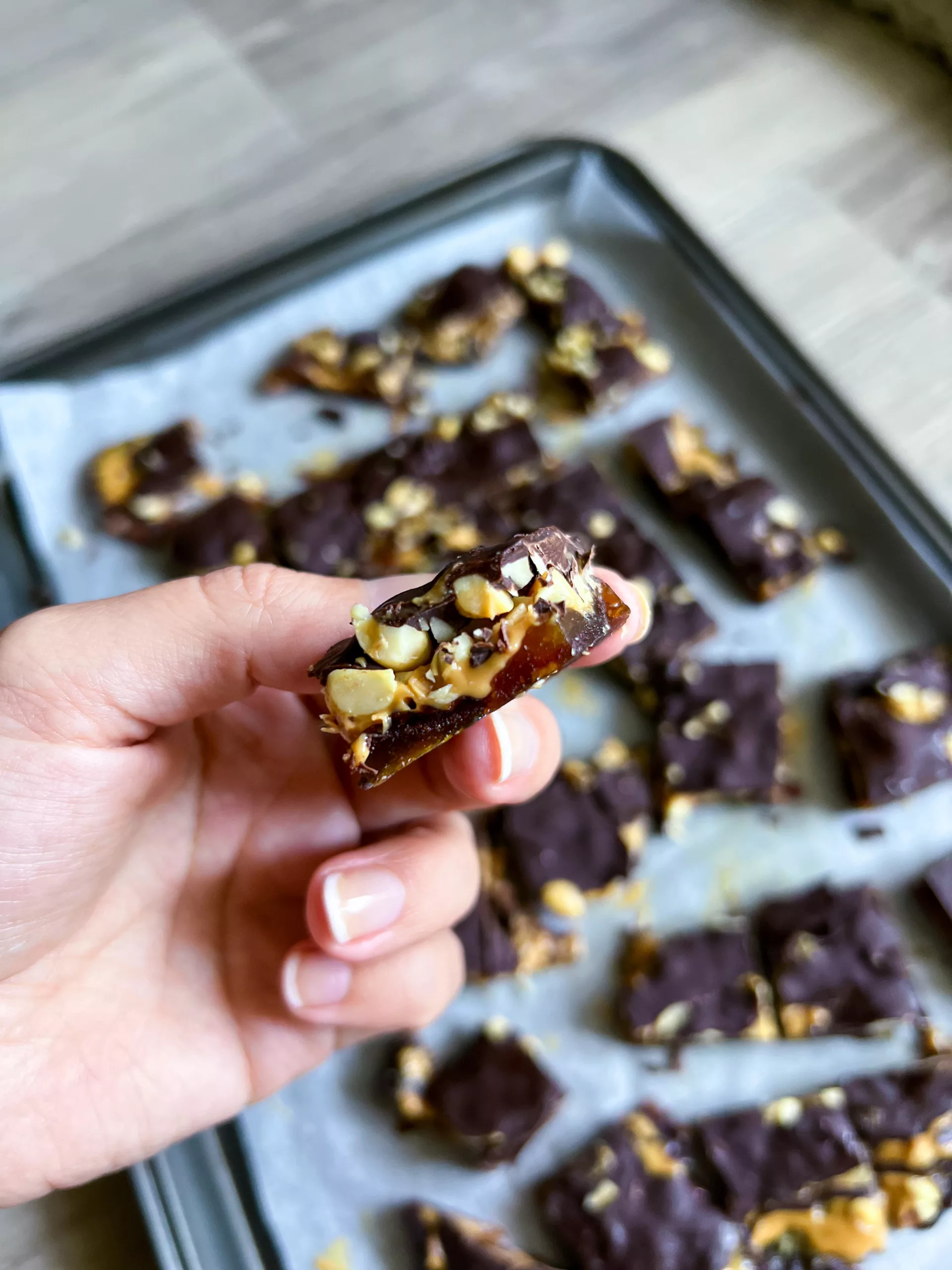 snickers date bark cut into squares