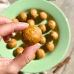 pumpkin energy balls in hand