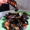 Vegan Mushroom Bacon in hand
