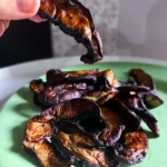 Vegan Mushroom Bacon in hand
