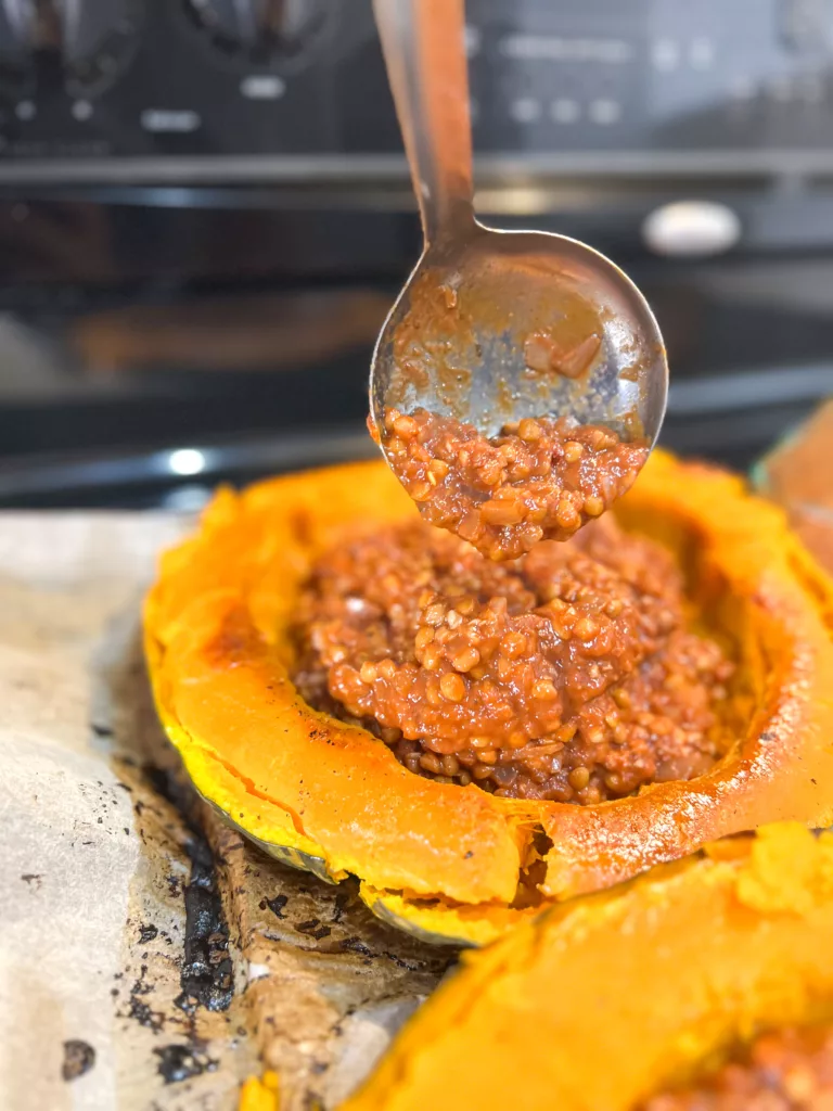 Vegan Acorn Squash filling added to squash