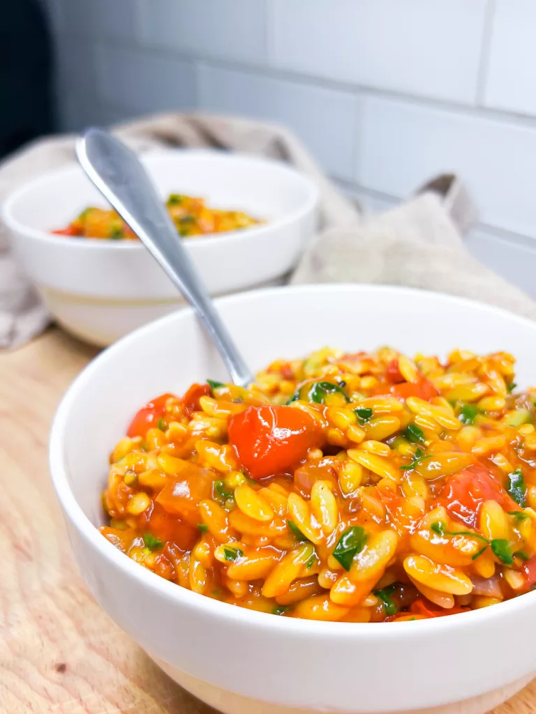 spicy orzo recipe in bowls vegan