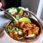 chili recipe vegan in wooden bowl with spoon