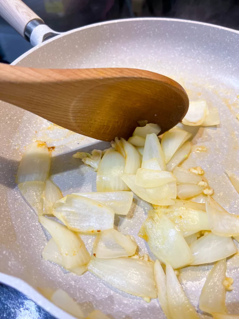 onion cooking in pan with some oil