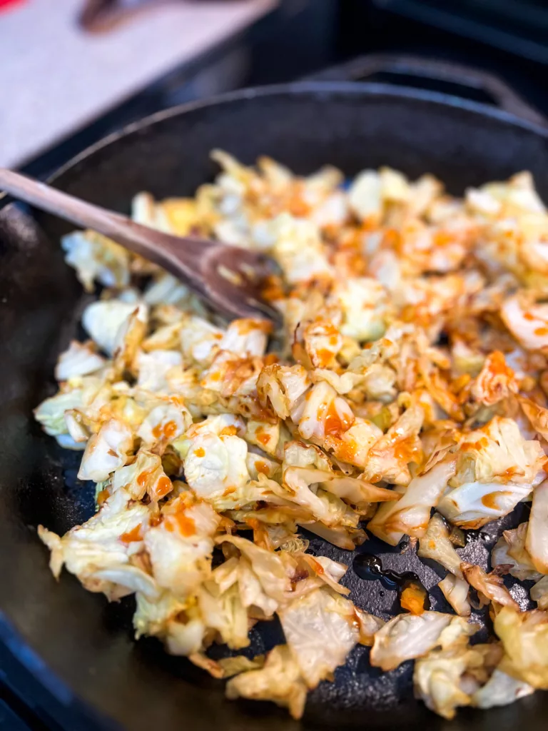 cooking gochujang mixture in pan