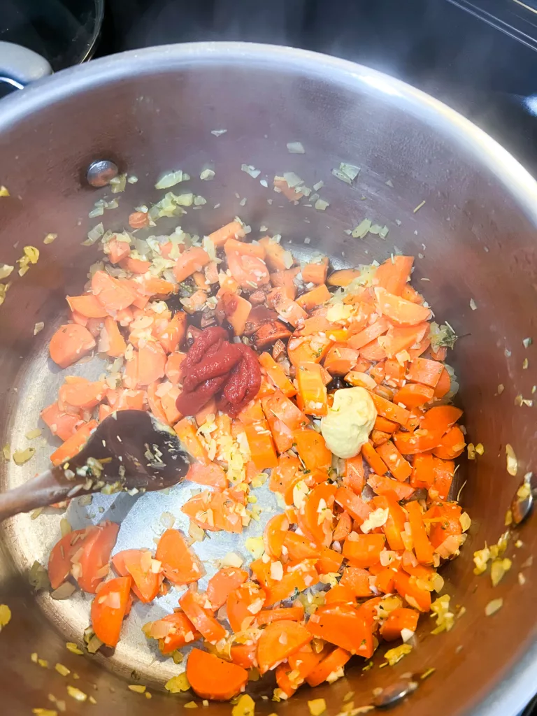 tomato paste and other spices for lentil stew vegan recipe