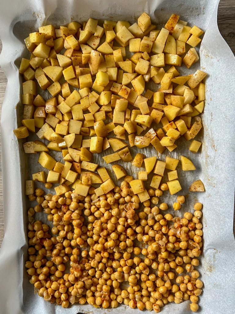 chickpeas and potato on baking sheets