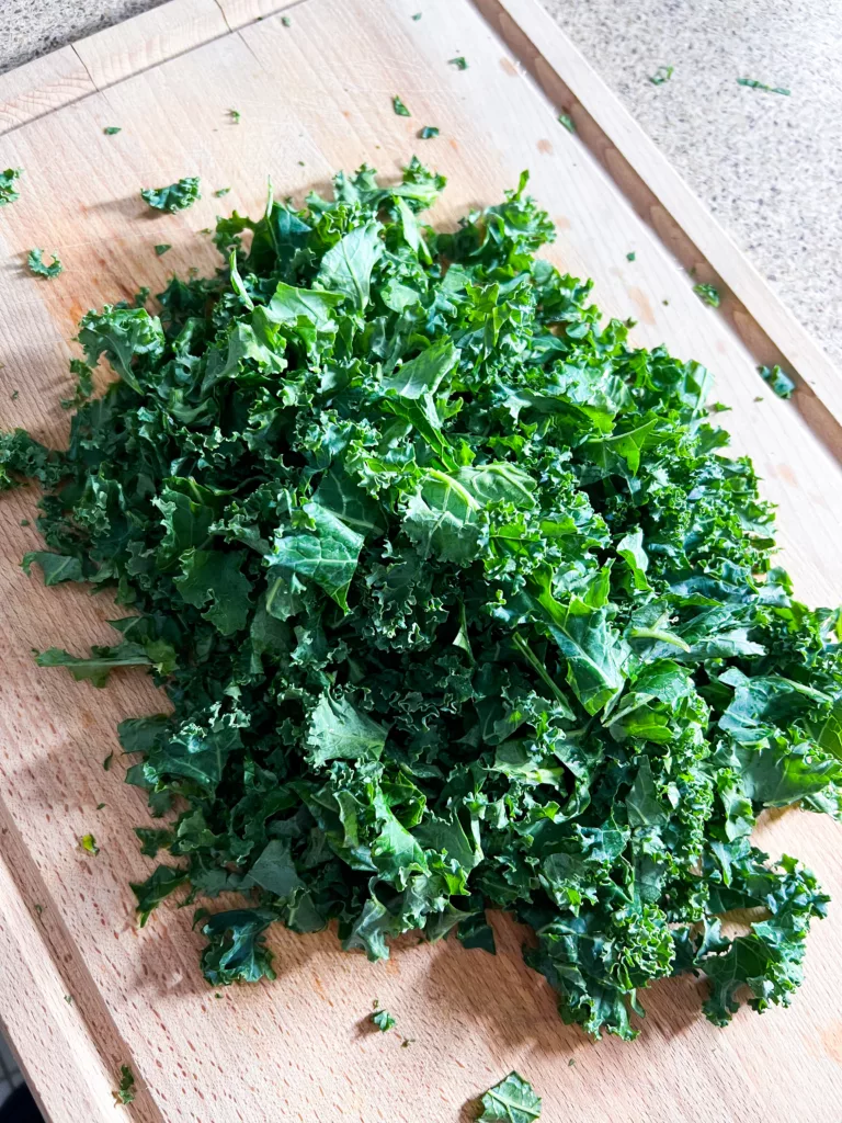 kale on wood cutting board