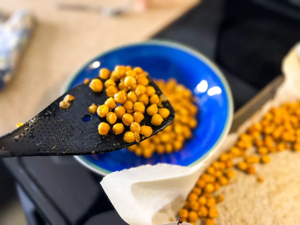 Roasted chickpeas on spatula