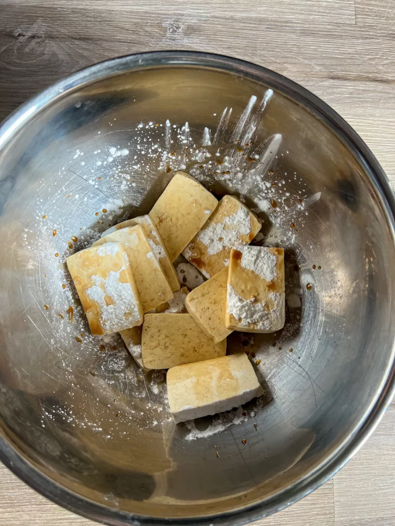 tofu in stainless steel bowl