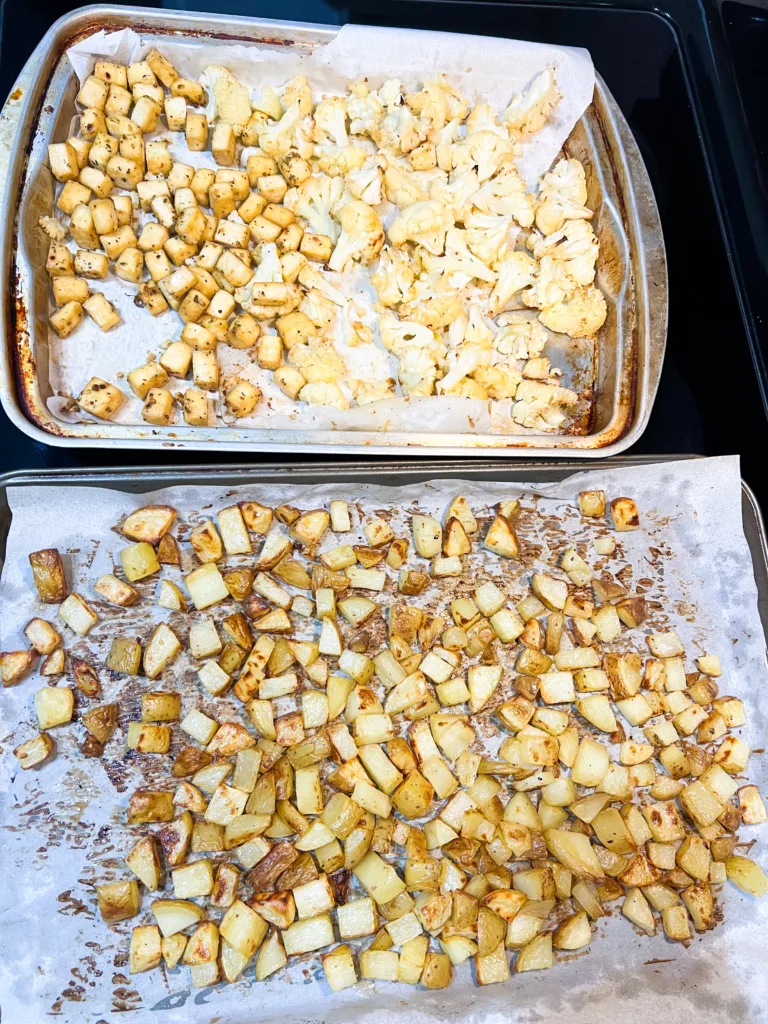 Tofu Sheet Pan Dinner With Cauliflower and Potatoes on pans