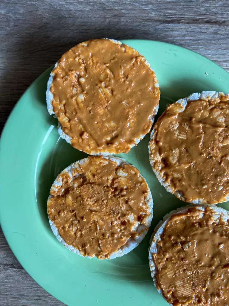 peanut butter spread on rice cakes