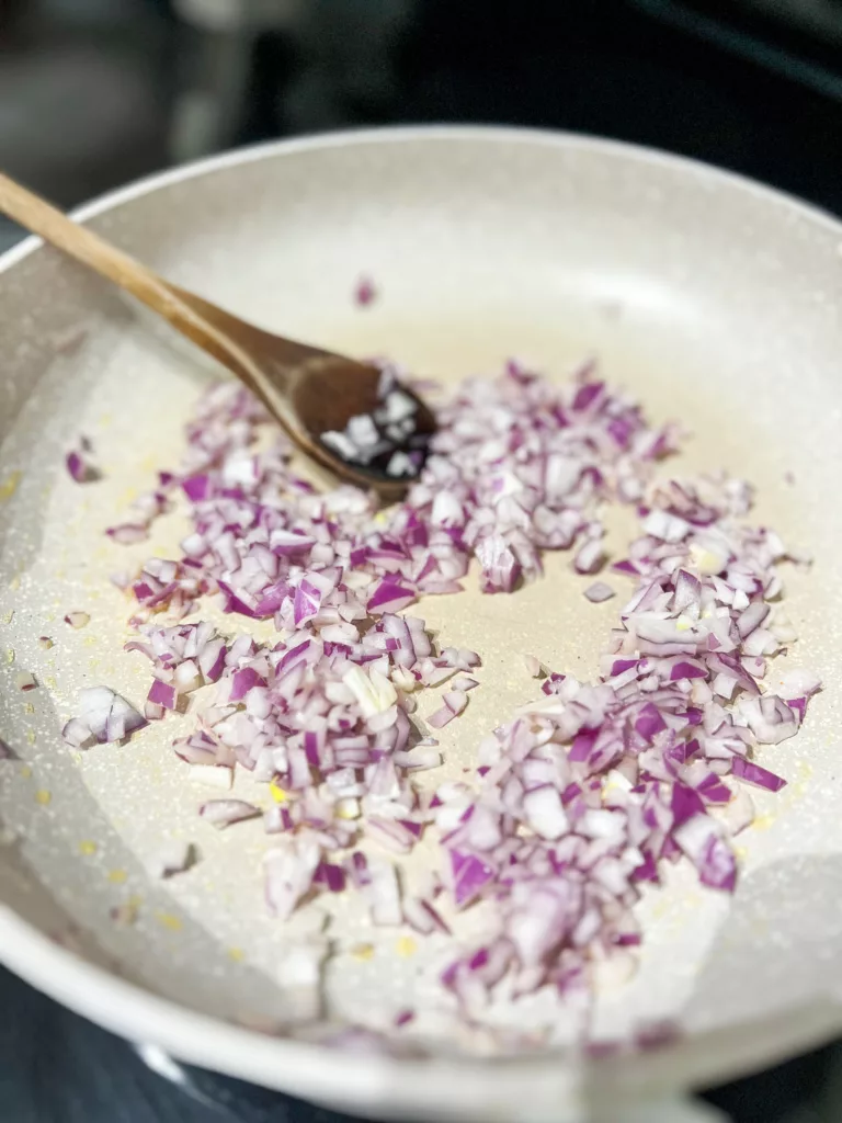 garlic and onion in frying pan