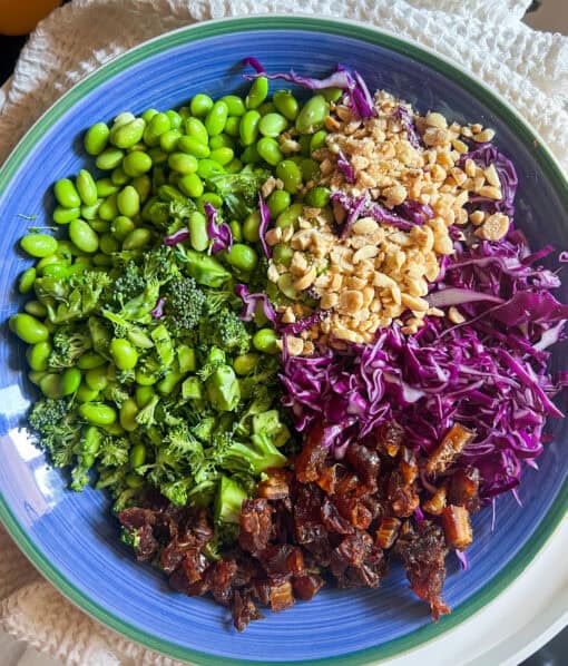 asian broccoli salad ingredients in a bowl