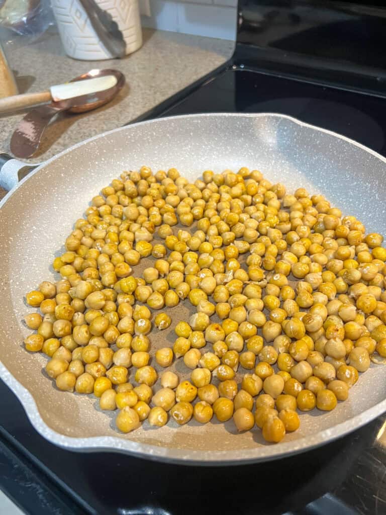 uncooked chickpeas in pan
