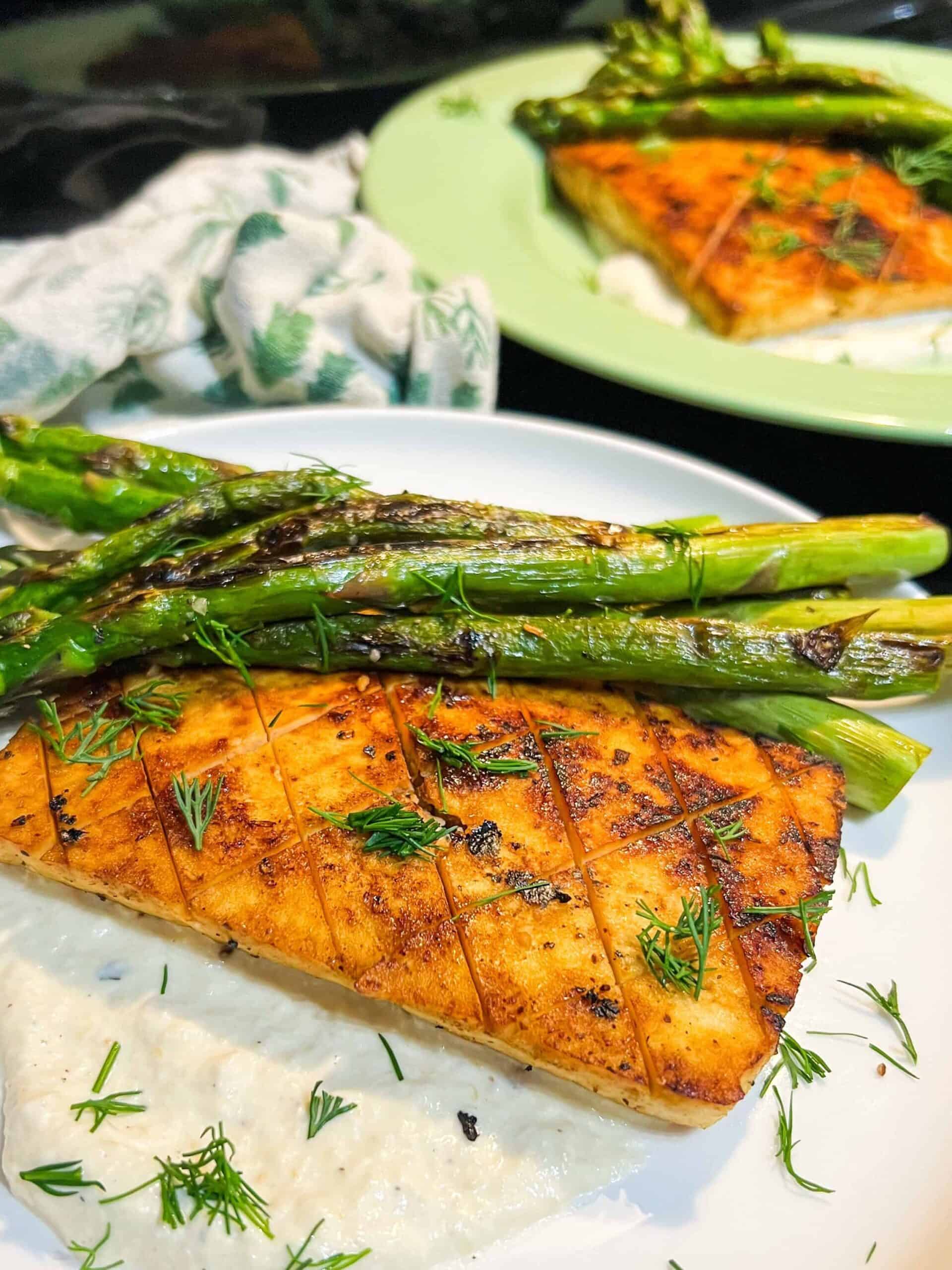 Lemon Pepper Tofu with Asparagus on plates