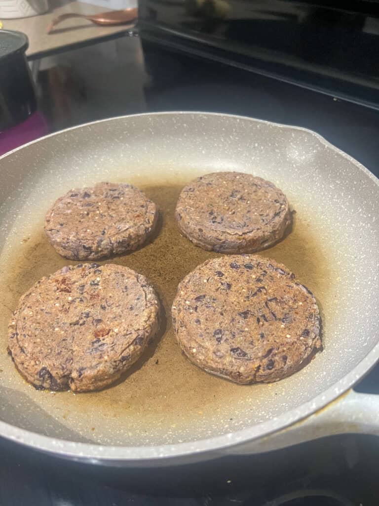 Quinoa Black Bean Burgers on frying pan