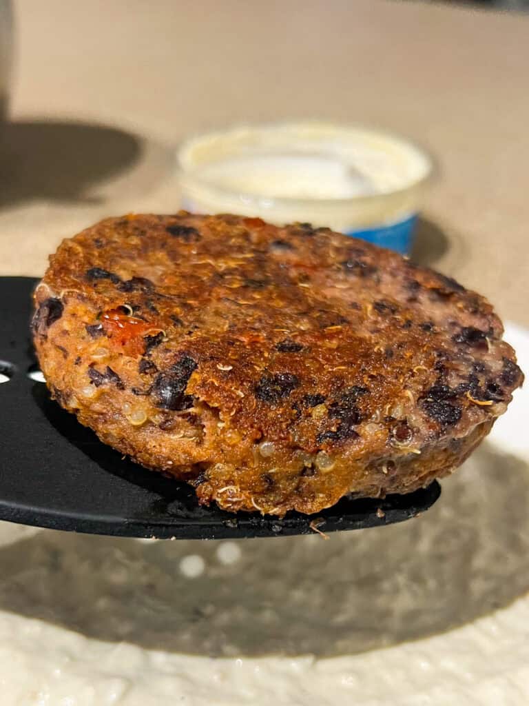 Quinoa Black Bean Burgers on spatula
