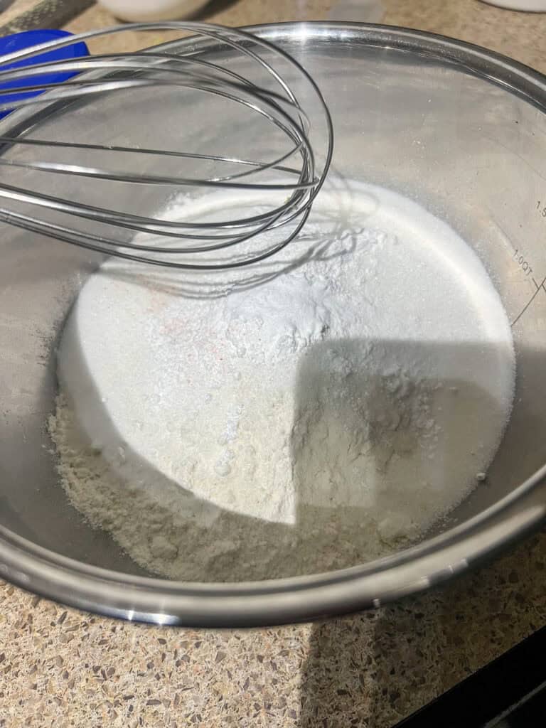 dry ingredients in silver mixing bowl