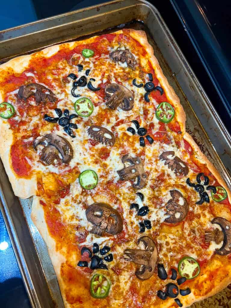skull mushrooms on pizza for halloween