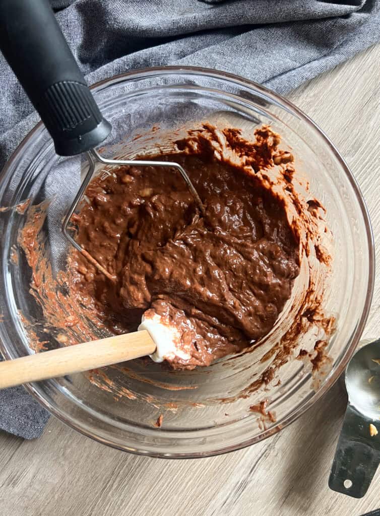 3 Ingredient Fudge Brownie batter in clear mixing bowl