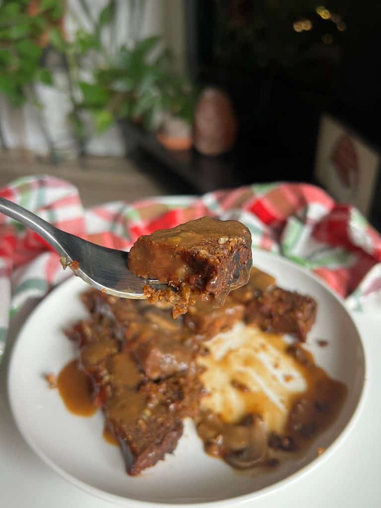bite of Vegan Lentil Loaf with vegan gravy