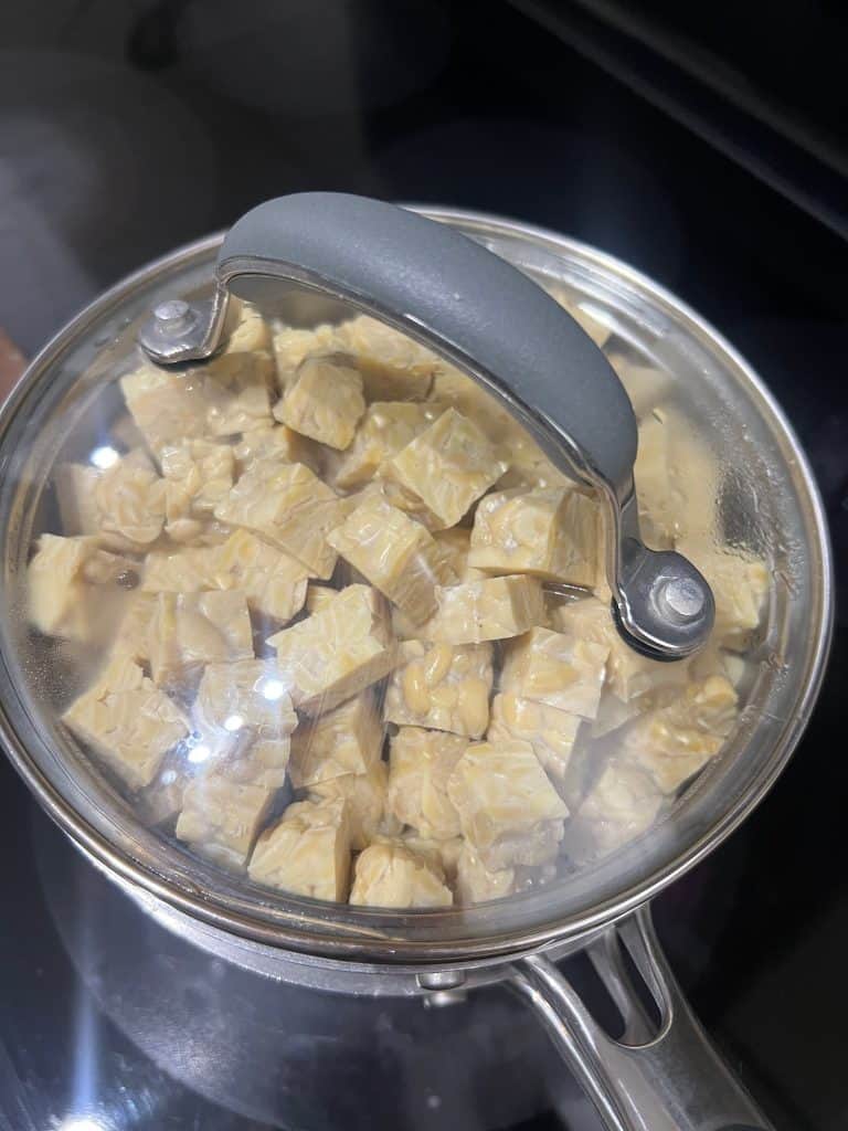 tempeh being steamed in pot