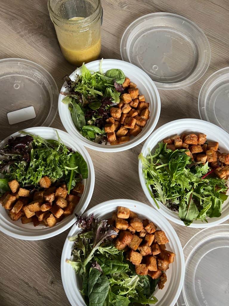 high protein vegan salad for meal prep greens tempeh lemon dressing