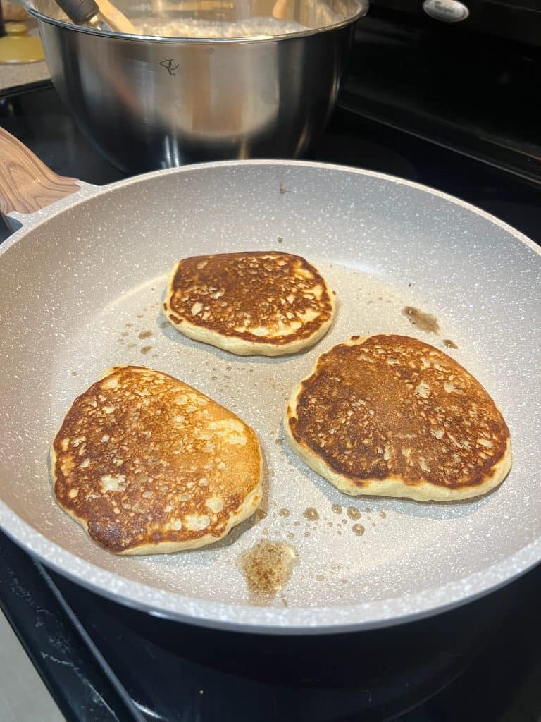 cottage cheese protein pancakes cooking in pan