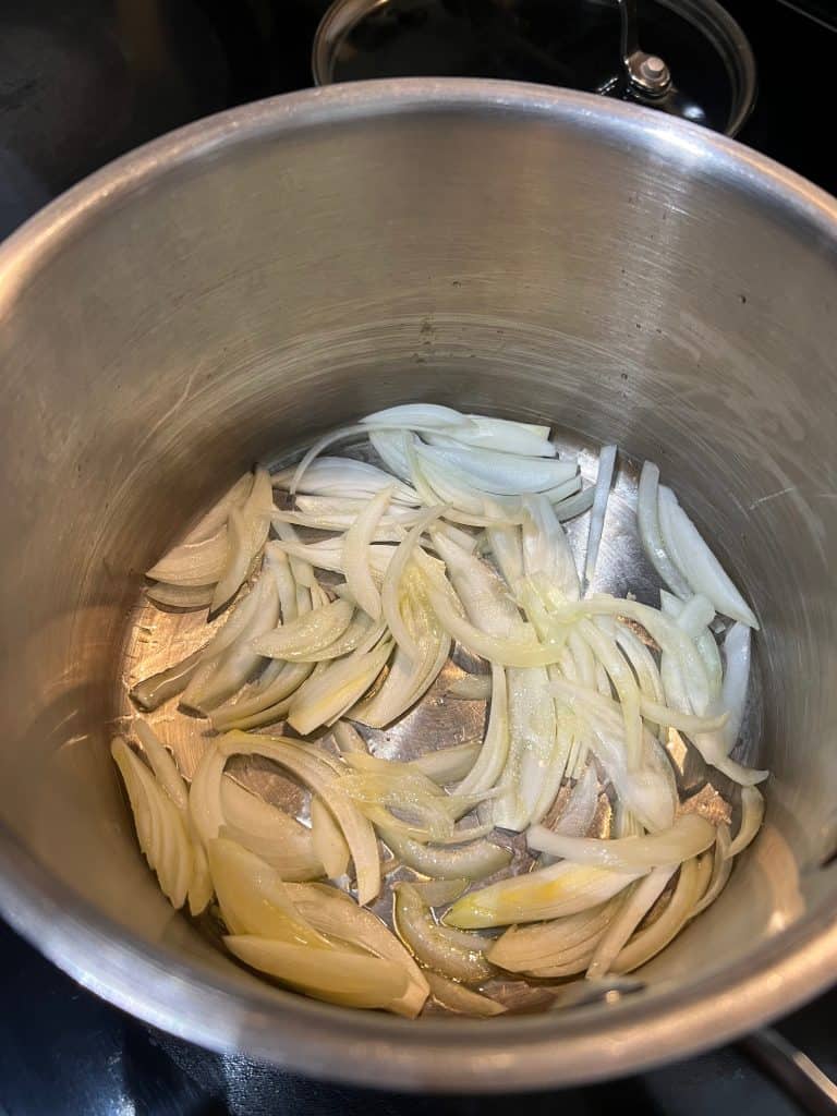 onions cooking in pot