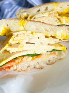 Tofu deli slices on sandwich with english muffins
