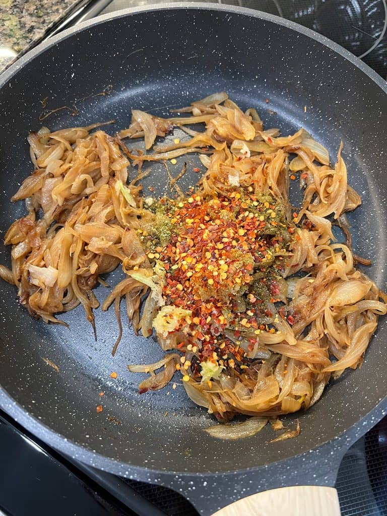 caramelized onions in pan with spices
