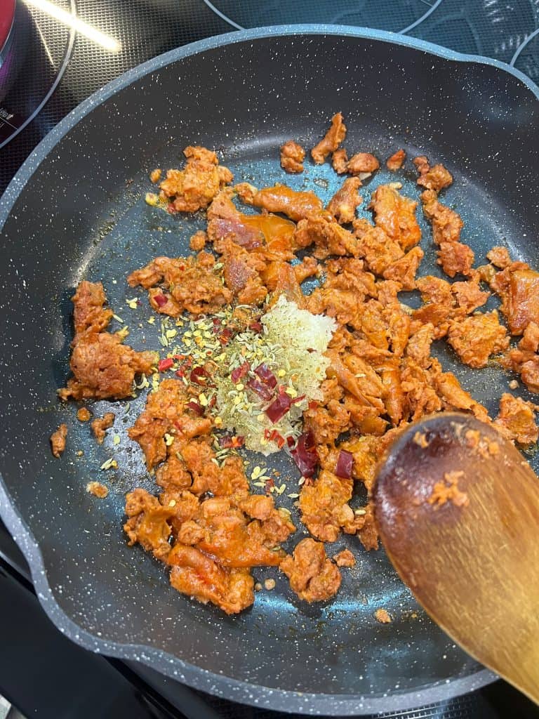 beyond sausage and spices in pan