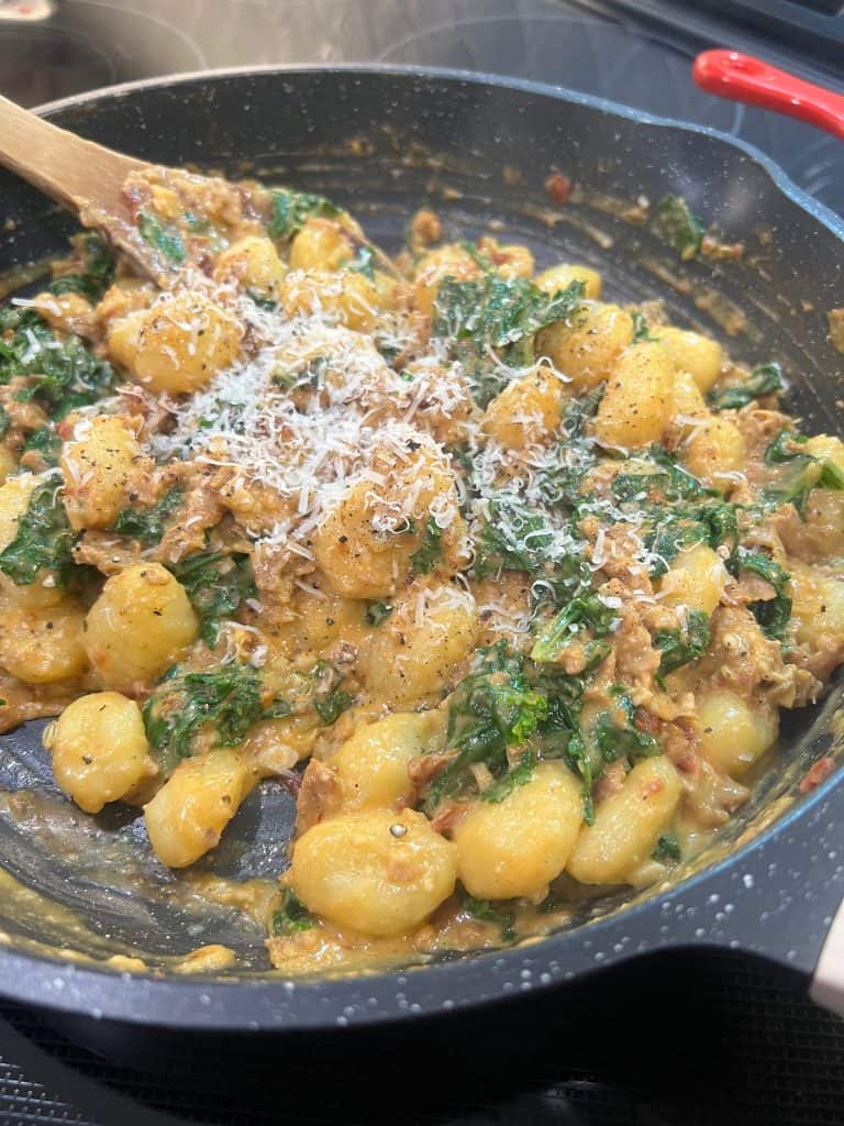 Creamy Tuscan Vegan Sausage Gnocchi in pan
