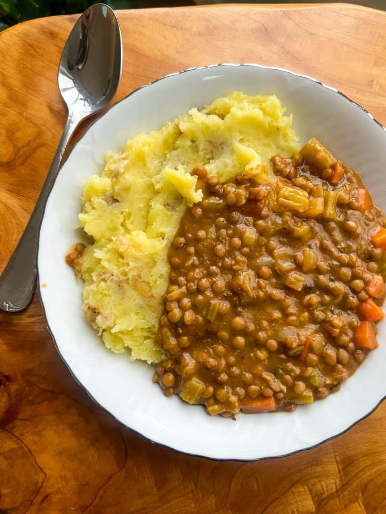 vegan lentil stew with creamy mashed potatoes